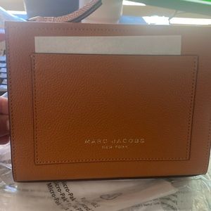 This a brand new Marc Jacobs leather pouch compatible to the LV Toiletry 19.